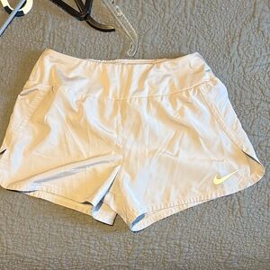 Nike Women's Light Cream Athletic Shorts